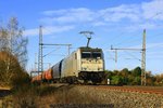 Rpool / LTE 186 426 mit Getreidewagen-Ganzzug am 29.10.2016 in Dedensen-Gümmer auf dem Weg Richtung Osten