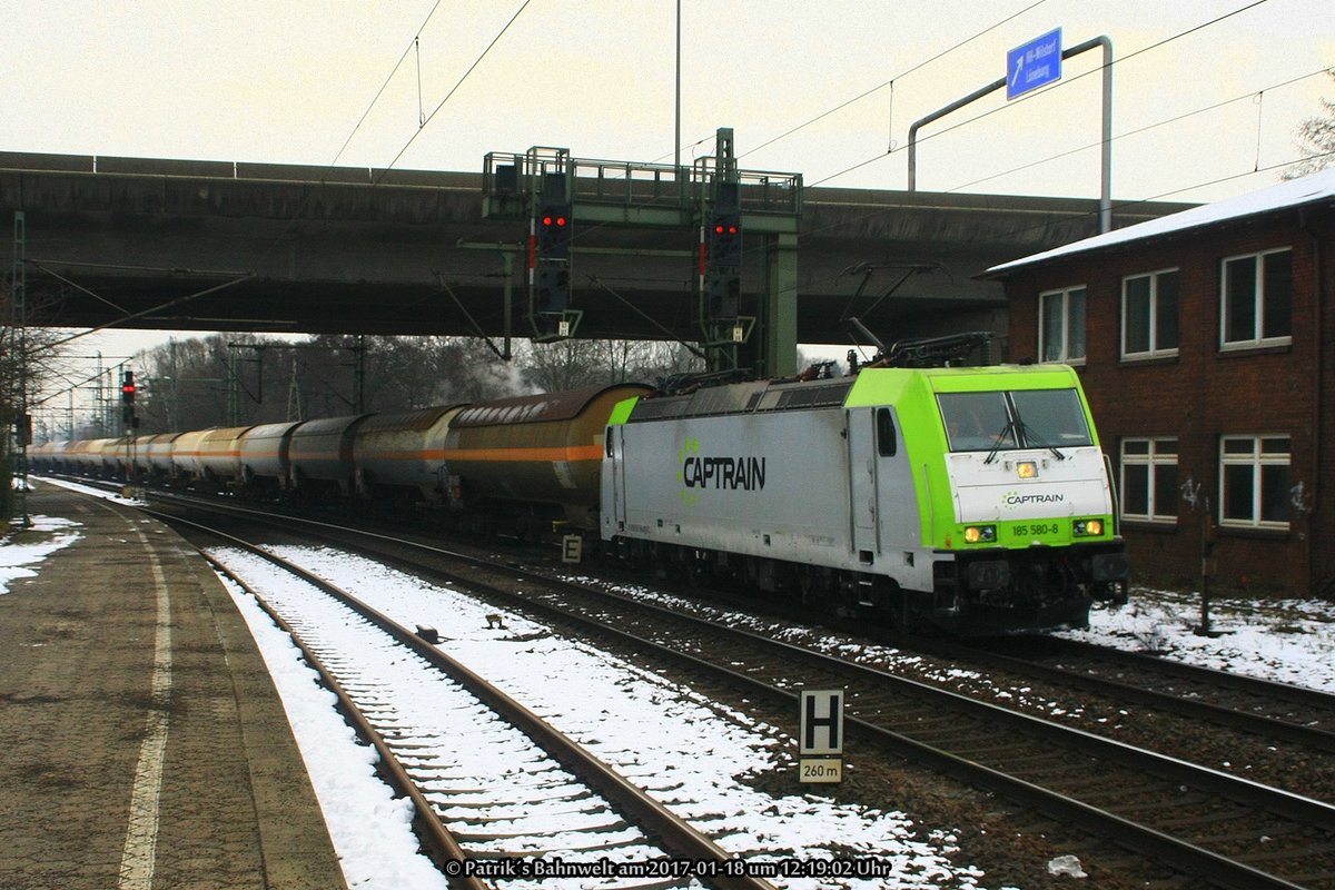 Captrain 185 580 mit Kesselwagenzug am 18.01.2017 in Hamburg-Harburg