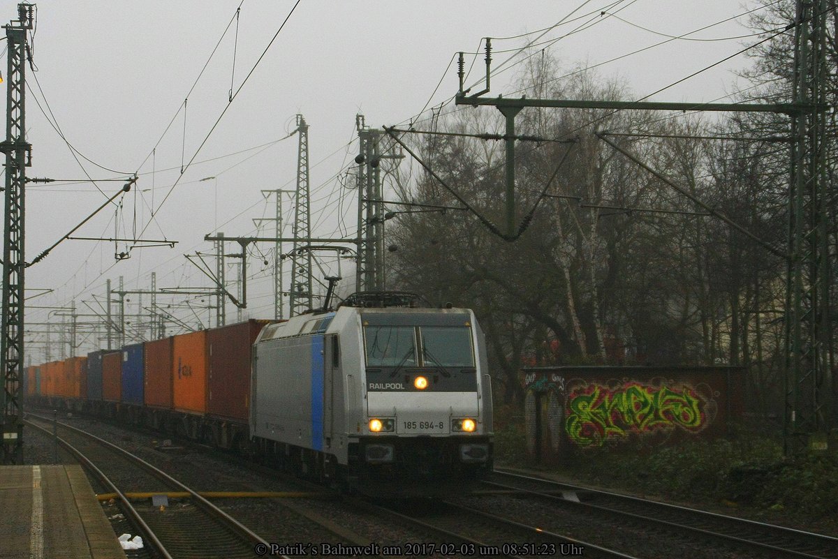 RAILPOOL 185 694 mit Containerzug am 03.02.2017 in Hamburg-Harburg