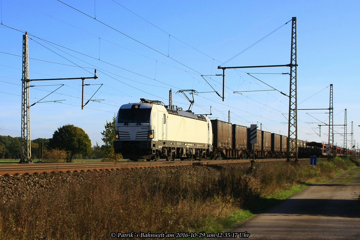 Rpool / VTG Rail Logistics 193 815 mit Nievenheimer am 29.10.2016 in Dedensen-Gümmer auf dem Weg Richtung Westen