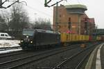 MRCE / Metrans 185 547 mit Containerzug am 20.01.2016 in Hamburg-Harburg