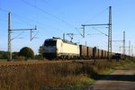 Rpool / VTG Rail Logistics 193 815 mit Nievenheimer am 29.10.2016 in Dedensen-Gümmer auf dem Weg Richtung Westen